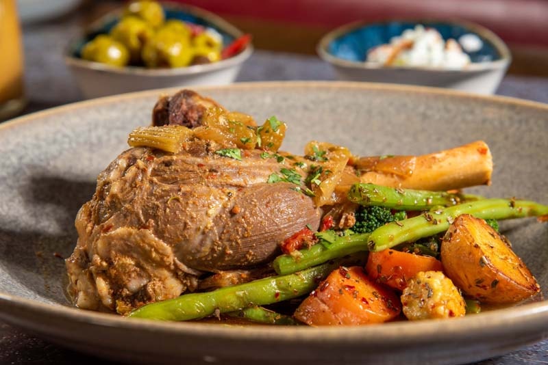 Slow-cooked lamb shank with vegetables