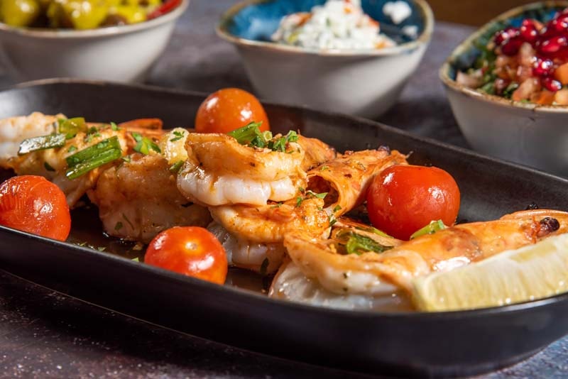 Sautéed prawns with cherry tomatoes
