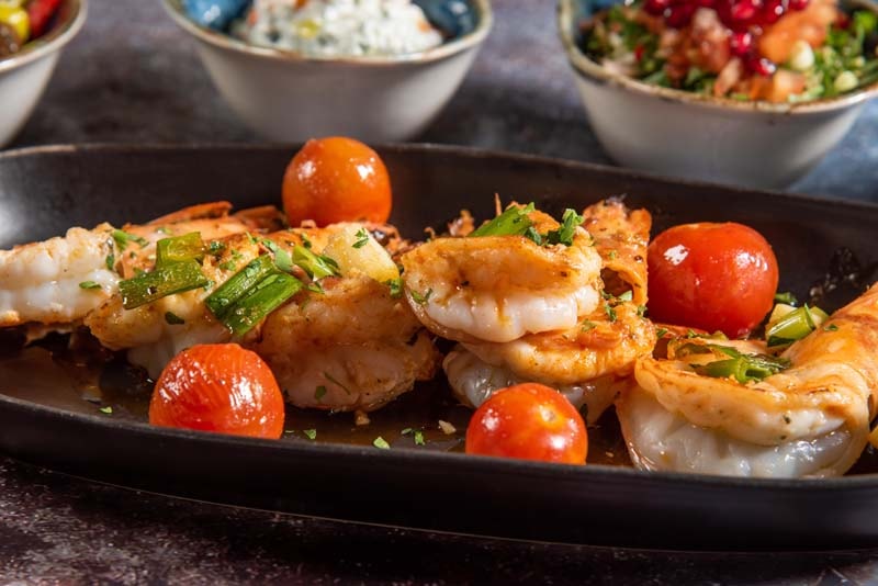 Seared prawns with garnish